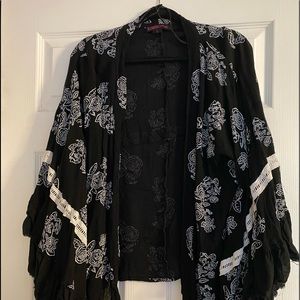 Looks great with jeans or skirt. Worn only once.